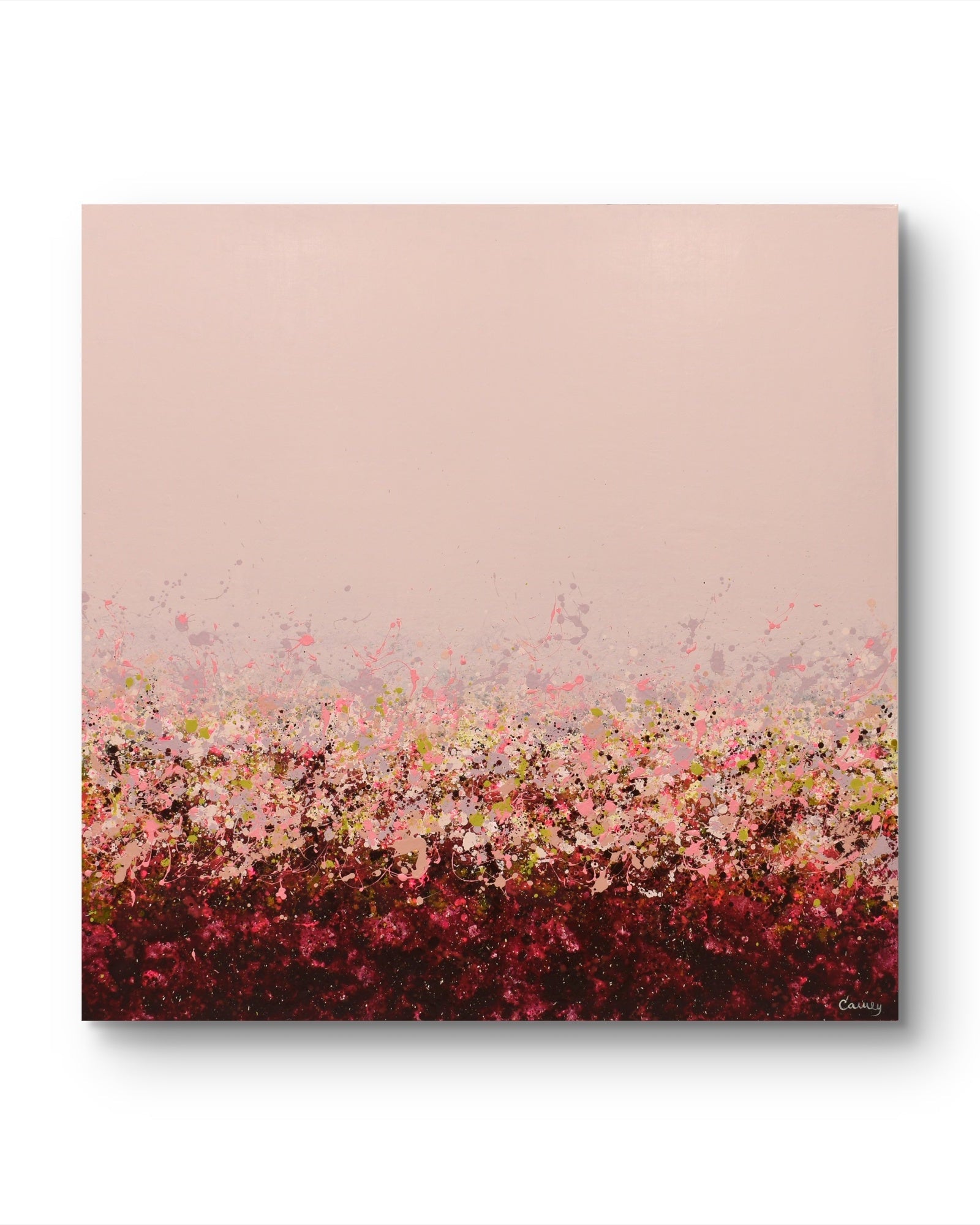 An abstract canvas painting featuring a soft dusty pink sky-like upper section and a dense, textured field of pink, red, burgundy, and small yellow-green accents along the bottom, shown against a clean white background with a subtle drop shadow.